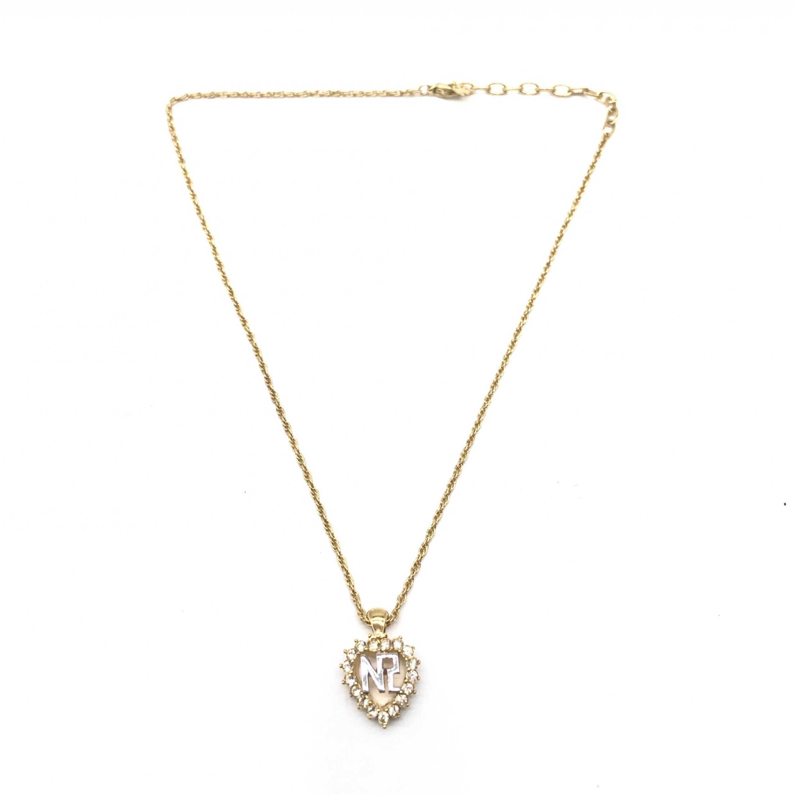 Nina Ricci Gold Tone Pendant Necklace With Heart Design