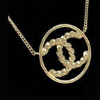 Chanel Gold Tone CC Circle Pendant Necklace