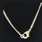 Chanel Gold Tone CC Circle Pendant Necklace