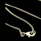 Chanel Gold Tone CC Circle Pendant Necklace