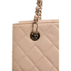 Chanel Quilted Leather Beauty Lock Flap Bag